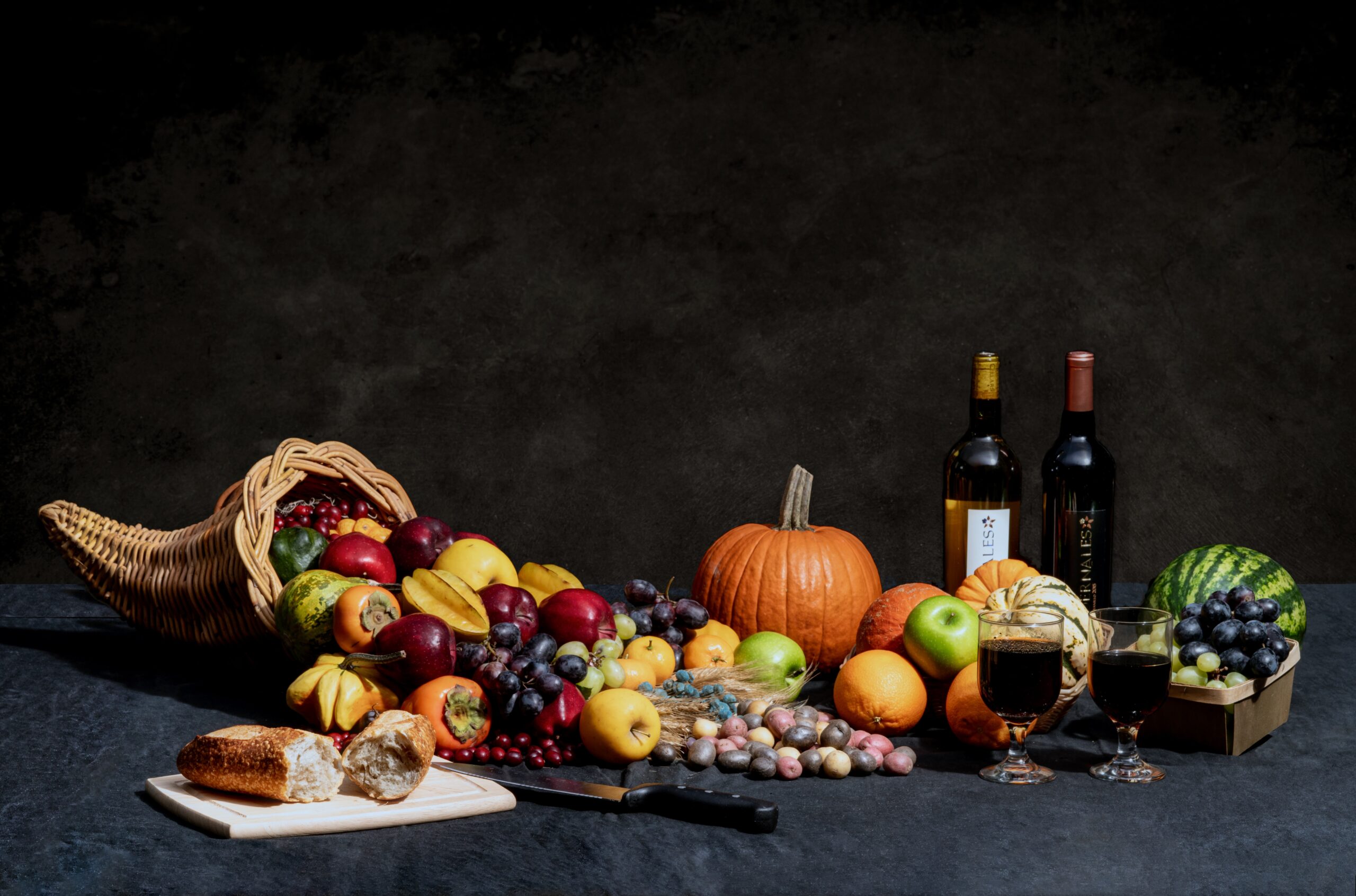 An assortment of wine and fruits